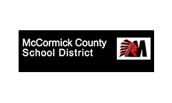 A black and white logo for mccormick county school district.