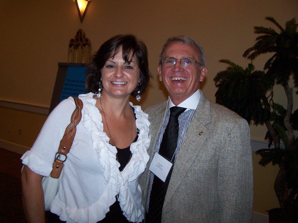 A man and woman posing for the camera.